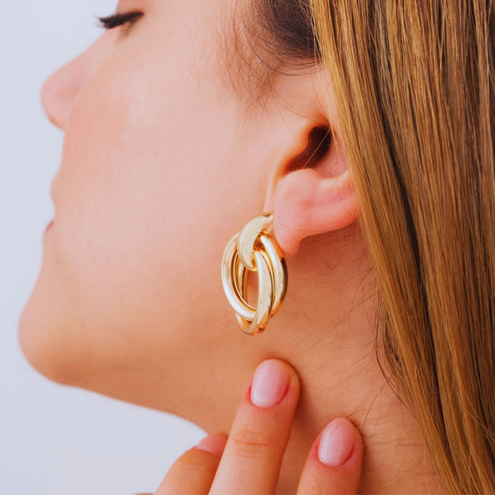 Gold Love Knot Geometric Drop Earrings – Bold, Modern & Eye-Catching