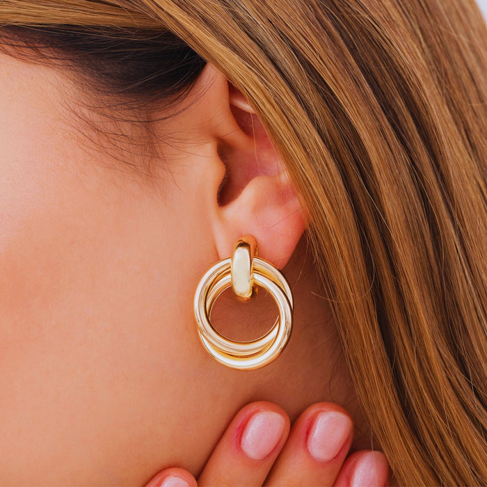 Gold Love Knot Geometric Drop Earrings – Bold, Modern & Eye-Catching