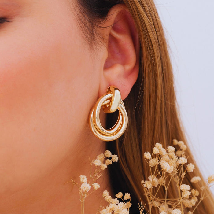 Gold Love Knot Geometric Drop Earrings – Bold, Modern & Eye-Catching